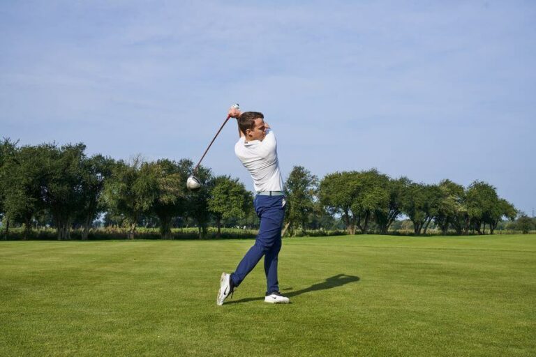 golfer release after hitting with driver